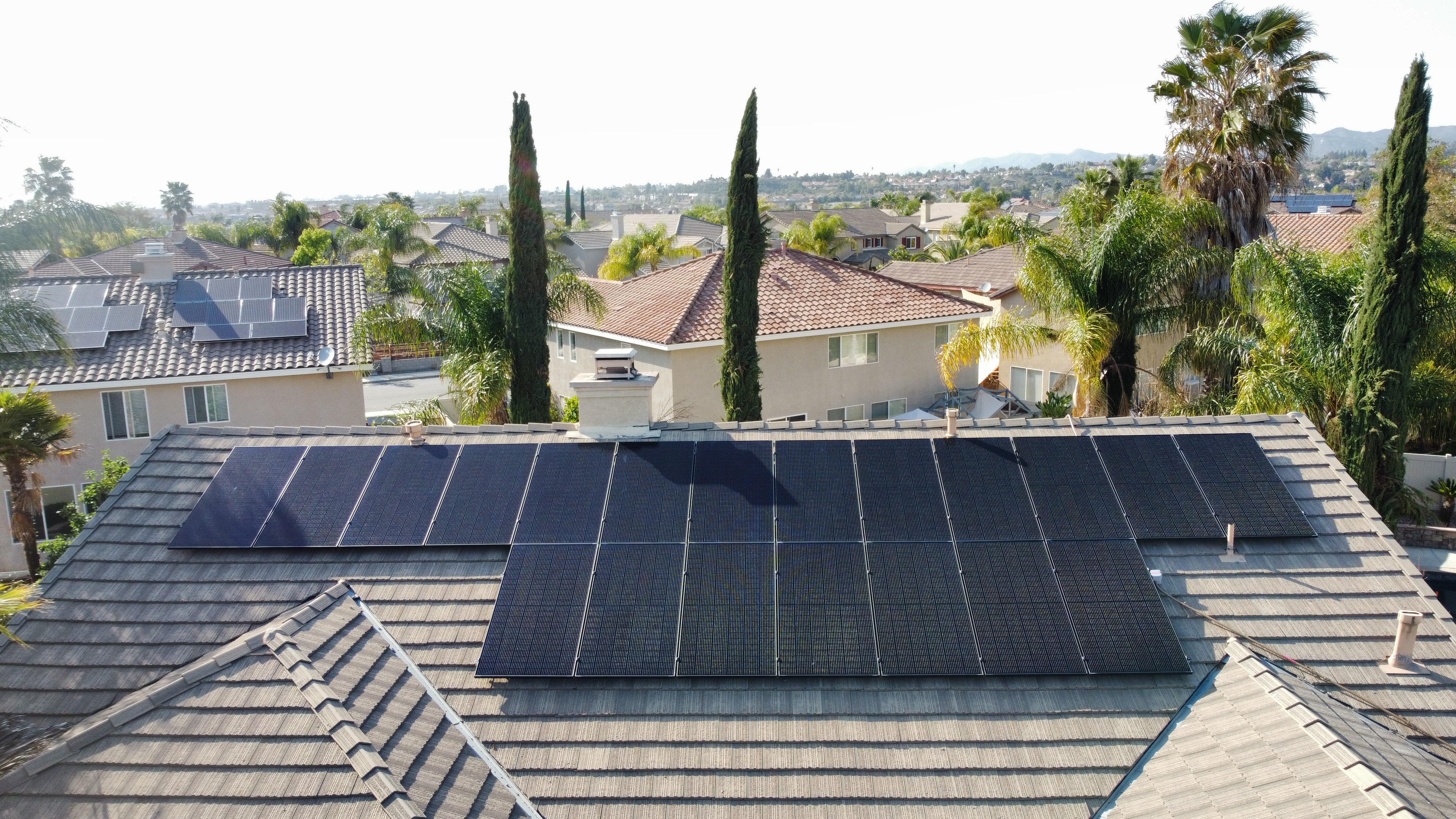 Temecula tile roof solar palm trees